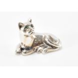 SILVER CAT FIGURINE WITH GREEN GLASS EYES