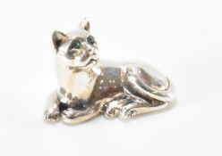 SILVER CAT FIGURINE WITH GREEN GLASS EYES