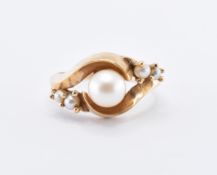 18CT GOLD & PEARL CROSSOVER RING