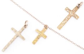 THREE 9CT GOLD CRUCIFIX PENDANTS