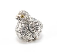 SILVER FIGURINE IN THE FORM OF A CHICK