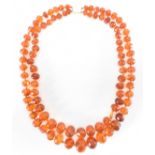 VINTAGE FACETED AMBER BEAD NECKLACE WITH 9CT GOLD CLASP