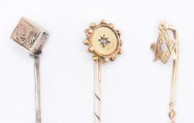 THREE GOLD STICK PINS INCLUDING A VICTORIAN DIAMOND STICK PIN