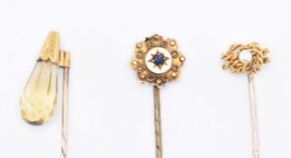 THREE GOLD STICK PINS