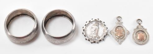 PAIR OF HALLMARKED SILVER NAPKIN RINGS WITH VICTORIA CROWN BROOCH &TWO MEDALS