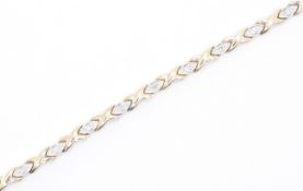 9CT GOLD AND DIAMOND TENNIS BRACELET