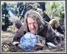 INDIANA JONES - JOHN HURT (1940-2017) - OFFICIAL PIX SIGNED 8X10" PHOTO