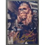 STAR WARS - PETER MAYHEW (1944-2019) - SIGNED 5X7" COLOUR PHOTO