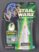 STAR WARS - CARRIE FISHER (1956-2016) - AUTOGRAPHED HASBRO ACTION FIGURE