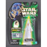 STAR WARS - CARRIE FISHER (1956-2016) - AUTOGRAPHED HASBRO ACTION FIGURE