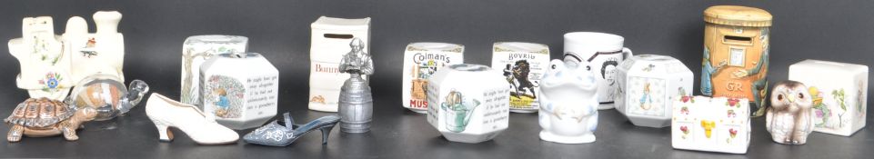 COLLECTION OF CERAMIC MONEY BOXES AND CABINET WARE