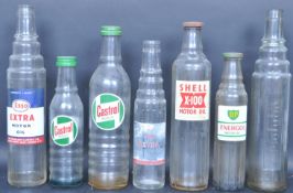 COLLECTION OF SEVEN VINTAGE 20TH CENTURY GLASS ADVERTISING OIL BOTTLES