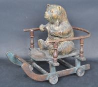 VINTAGE 20TH CENTURY CARVED WOODEN CHILDRENS TOY BEAR ON A CART