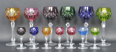COLLECTION OF MULTICOLOUR CRYSTAL CUT GLASS DRINKING GLASSES