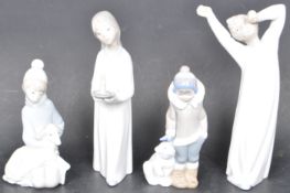 COLLECTION OF FOUR LLADRO FIGURINES