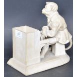 20TH CENTURY SARREGUEMINES MONKEY PIANO PLAYER