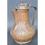 AN UNUSUAL 19TH CENTURY COPPER SPARROW BEAK JUG