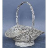 EARLY 20TH CENTURY WOVEN METAL BASKET