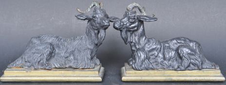 PAIR OF VINTAGE BLACK SPELTER RECLINING RAMS