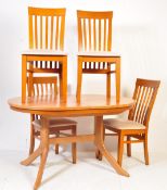 20TH CENTURY DANISH INSPIRED EXTENDING DINING TABLE AND CHAIRS