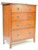 A 1920'S OAK UPRIGHT CHEST OF DRAWERS