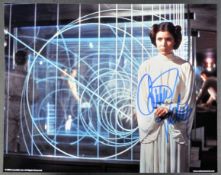 STAR WARS - CARRIE FISHER (1956-2016) - OFFICIAL SIGNED 8X10" PHOTO