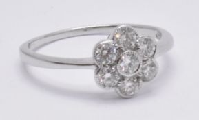 18CT WHITE GOLD DIAMOND FLOWER HEAD CLUSTER RING