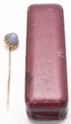 CABOCHON STAR SAPPHIRE AND GOLD STICK PIN - CASED