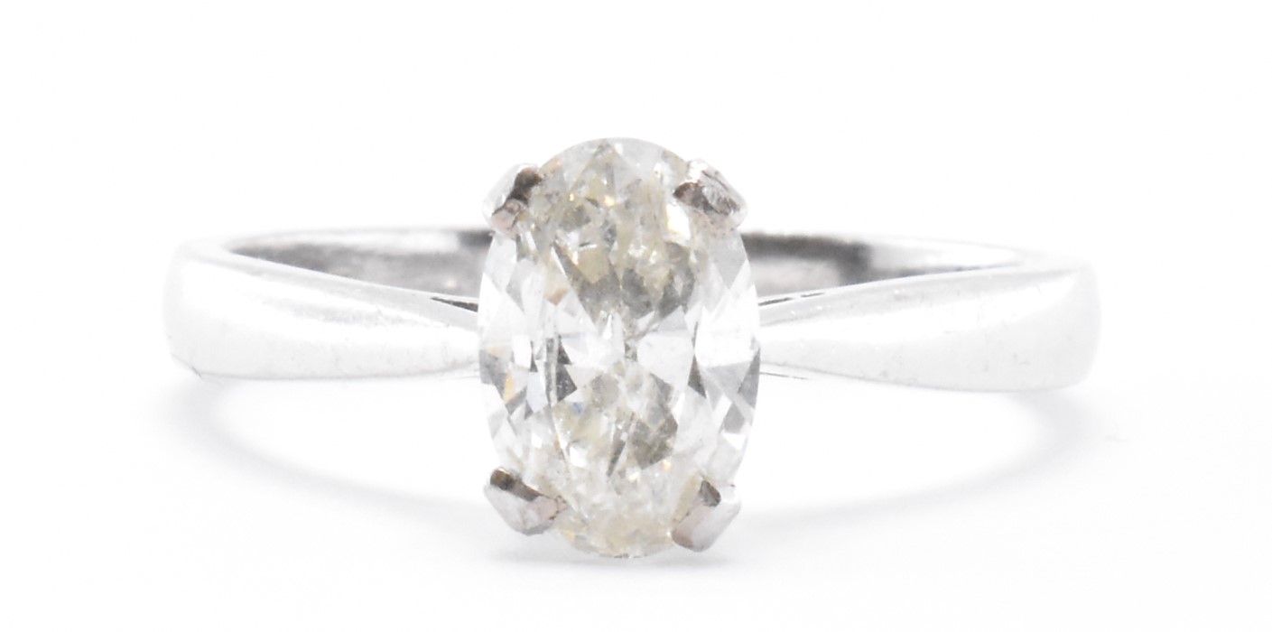 18CT WHITE GOLD & DIAMOND SOLITAIRE RING