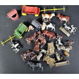 COLLECTION OF VINTAGE CAST METAL FARM ANIMALS AND EQUIPMENT