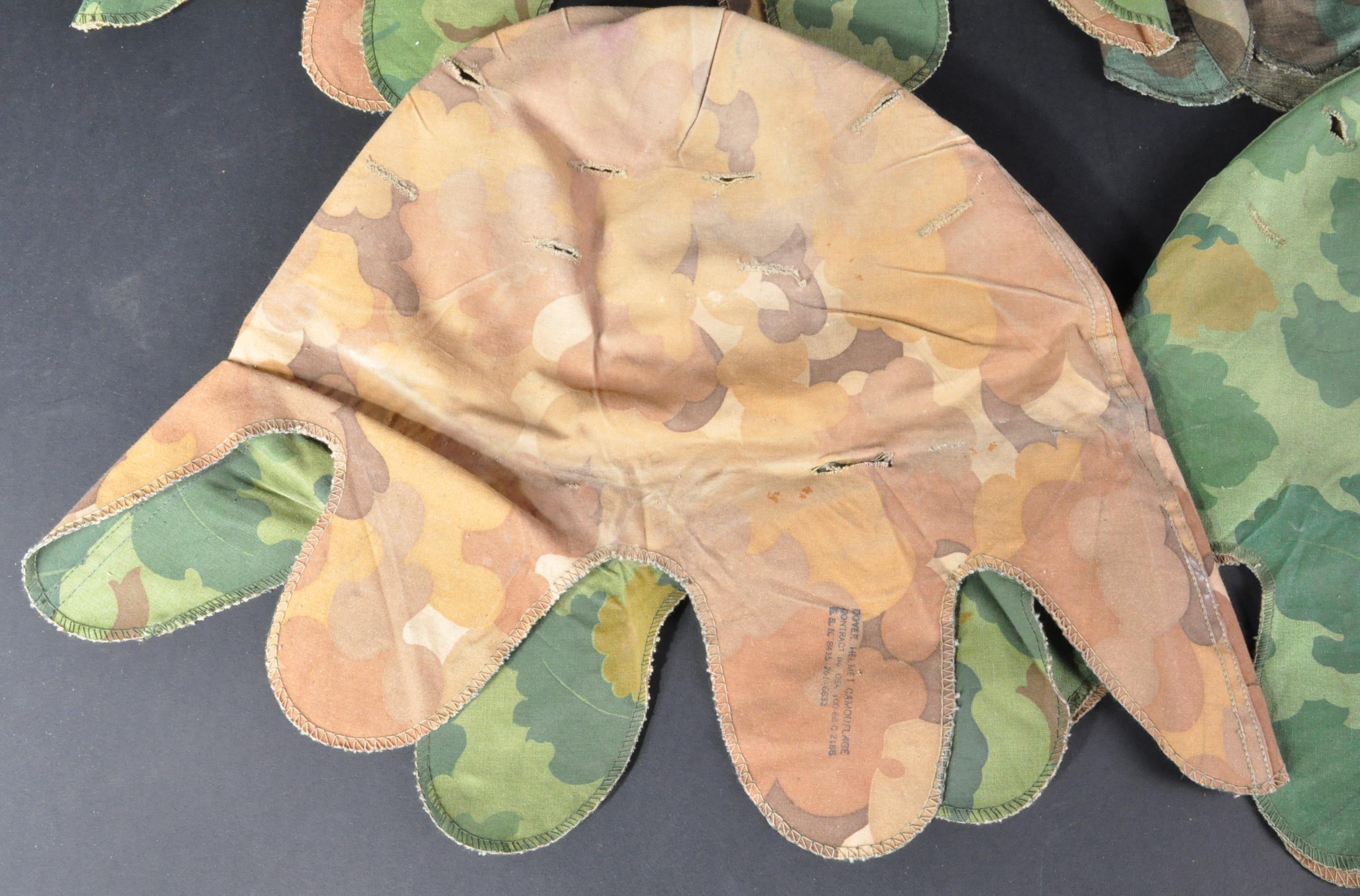 COLLECTION OF FOUR 20TH CENTURY CAMOUFLAGE HELMET COVERS - Image 2 of 6