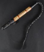 EARLY 20TH CENTURY TRIBAL BONE INLAID WHIP WITH HIDDEN SPIKE