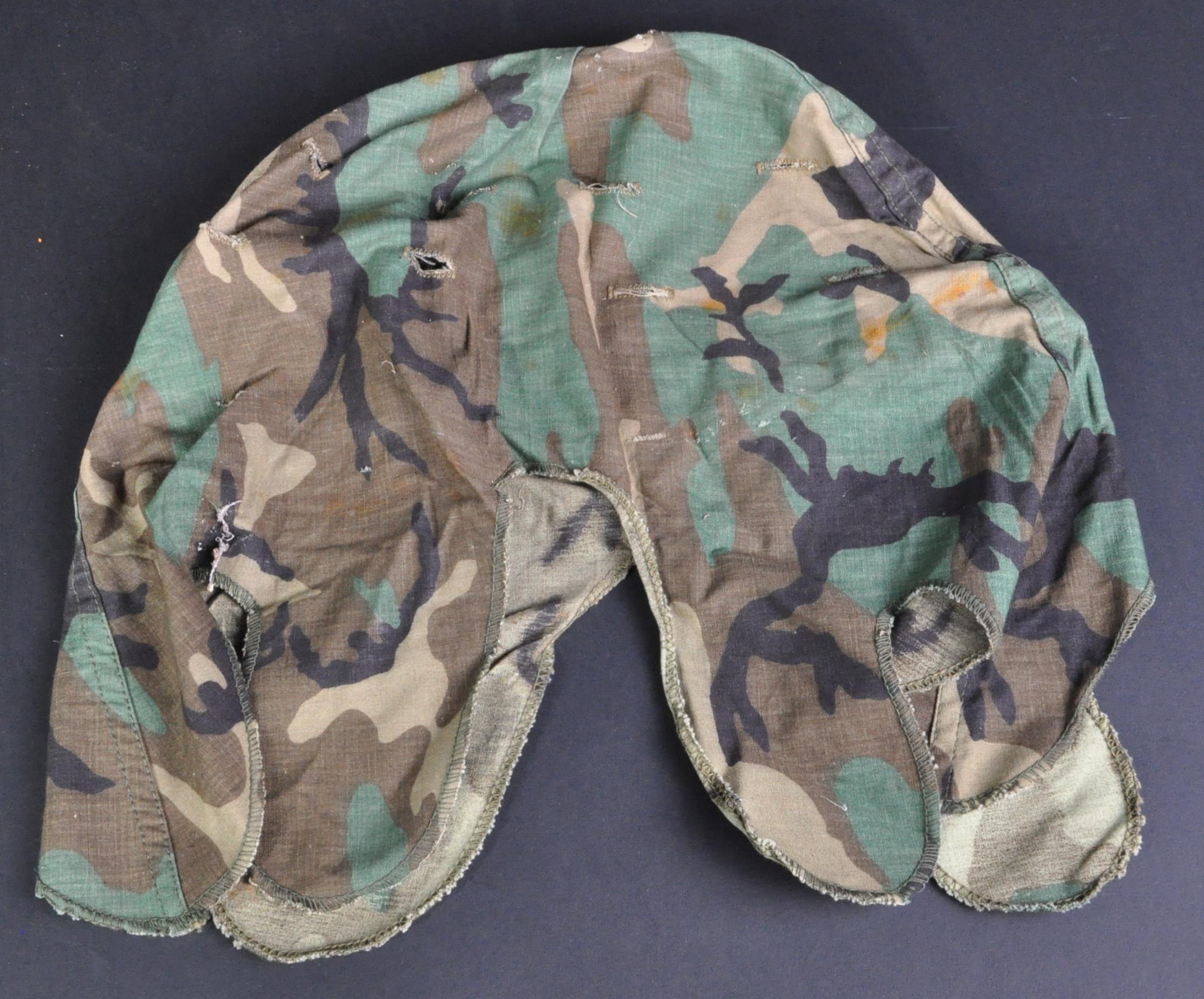 COLLECTION OF FOUR 20TH CENTURY CAMOUFLAGE HELMET COVERS - Image 6 of 6