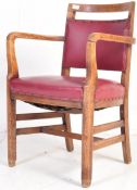 EARLY 20TH CENTURY OXBLOOD VINYL AND OAK BRIDGE CHAIR