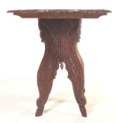 A 19th century Victorian Arts and Crafts mahogany metamorphic carved centrepiece table having floral