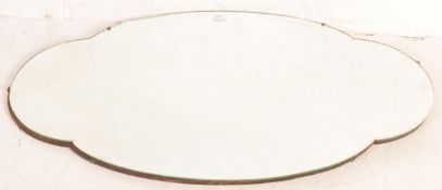 1930'S ART DECO OVOID SHAPED LARGE FRAMELESS WALL MIRROR