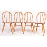 Lucian Ercolani for Ercol Furniture. A  set of 4 20th century Ercol beech and elm wood Windsor