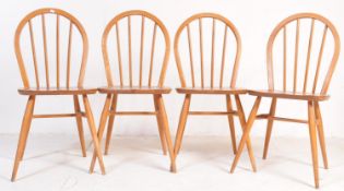 Lucian Ercolani for Ercol Furniture. A  set of 4 20th century Ercol beech and elm wood Windsor