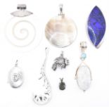 COLLECTION OF SILVER STONE SET PENDANTS.