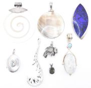 COLLECTION OF SILVER STONE SET PENDANTS.