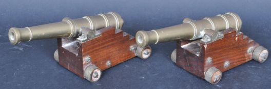 PAIR BRASS & MAHOGANY DESK TOP CANNONS