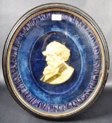 19TH CENTURY ORMOLU PLAQUE OF CHARLES DICKENS IN FRAME