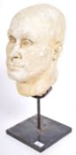20TH CENTURY PLASTER BUST OF A GENTLEMAN IN WHITE