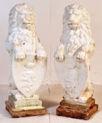 MATCHING PAIR OF RECONSTITUTED STONE LION GARDEN FIGURES