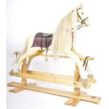 CONTEMPORARY CARVED ROCKING PALOMINO HORSE - 'XANTHOS'