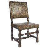 17TH CENTURY SPANISH CARVED WALNUT AND LEATHER CHAIR