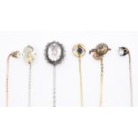 GROUP OF VICTORIAN STICK PINS INCLUDING JOCKEY HAT & WHITE STONE