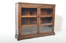 VINTAGE 20TH CENTURY JACOBEAN REVIVAL GLAZED BOOKCASE