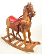 20TH CENTURY WOODEN AND LEATHER ROCKING HORSE