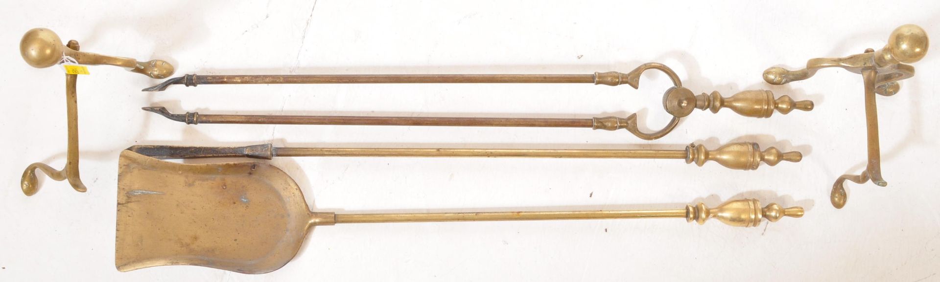 A 19TH CENTURY SOLID BRASS FIRESIDE COMPANION SET